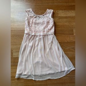 David’s Bridal, Flower Girl Dress. Size 6. Color is “Petal”. Used.